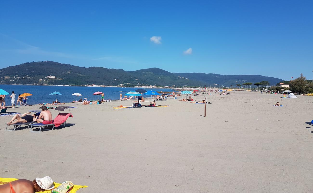 Photo of Spiaggia di Marinella di Sarzana with bright sand surface