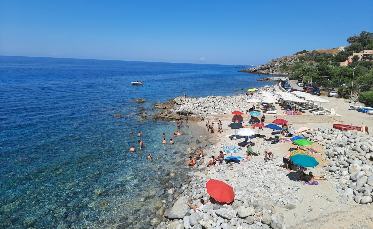 Photo of Spiaggia di Coccorino with bright sand & rocks surface