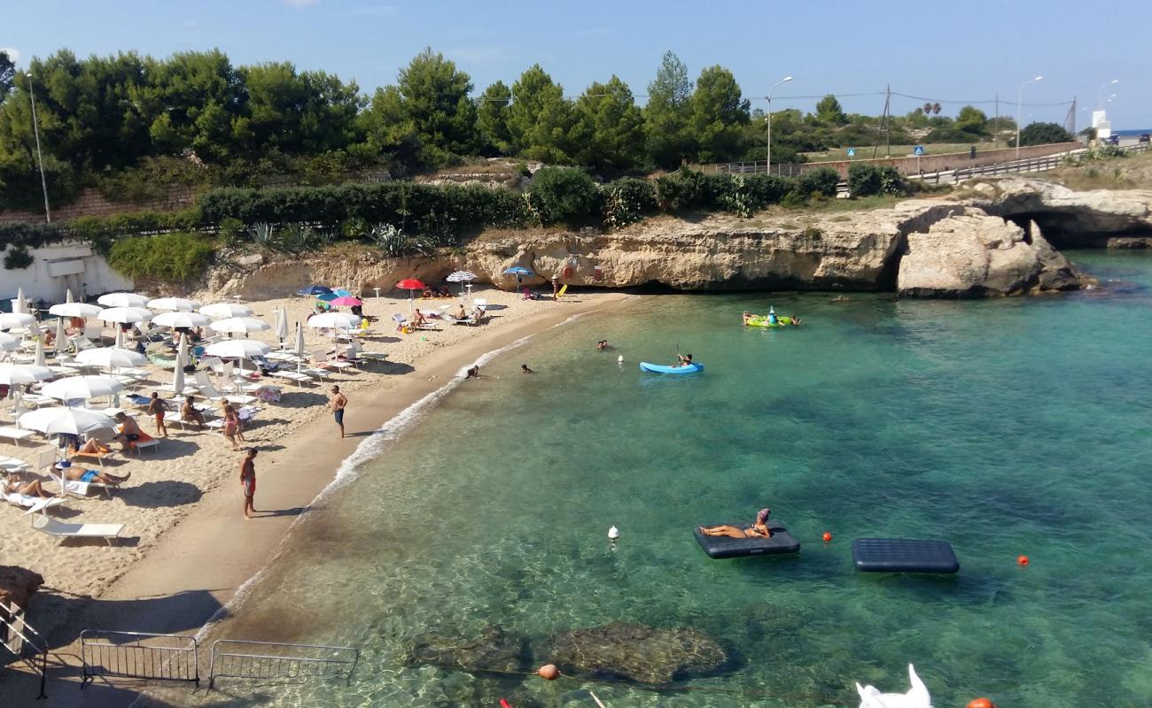 Photo of Porto Giardino Beach with bright sand surface