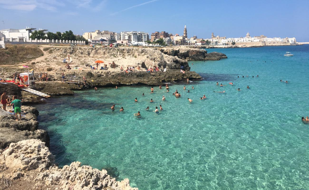 Photo of Cala Porto Nero with concrete cover surface