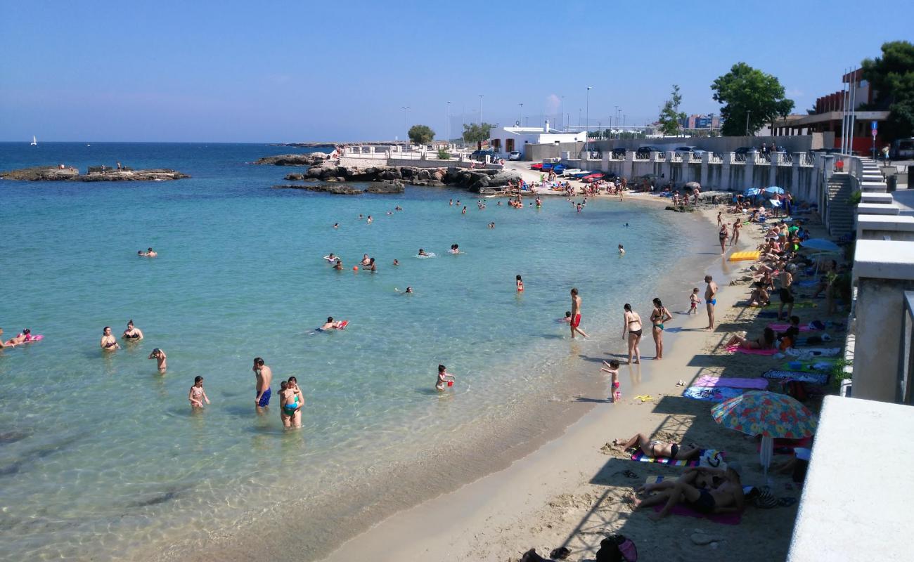 Photo of Spiaggia Cala Porta Vecchia with bright sand surface