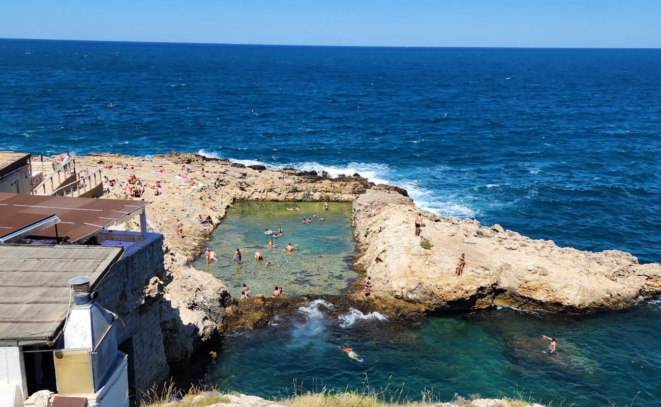 Photo of Lido Grottone-Polignano with rocks cover surface