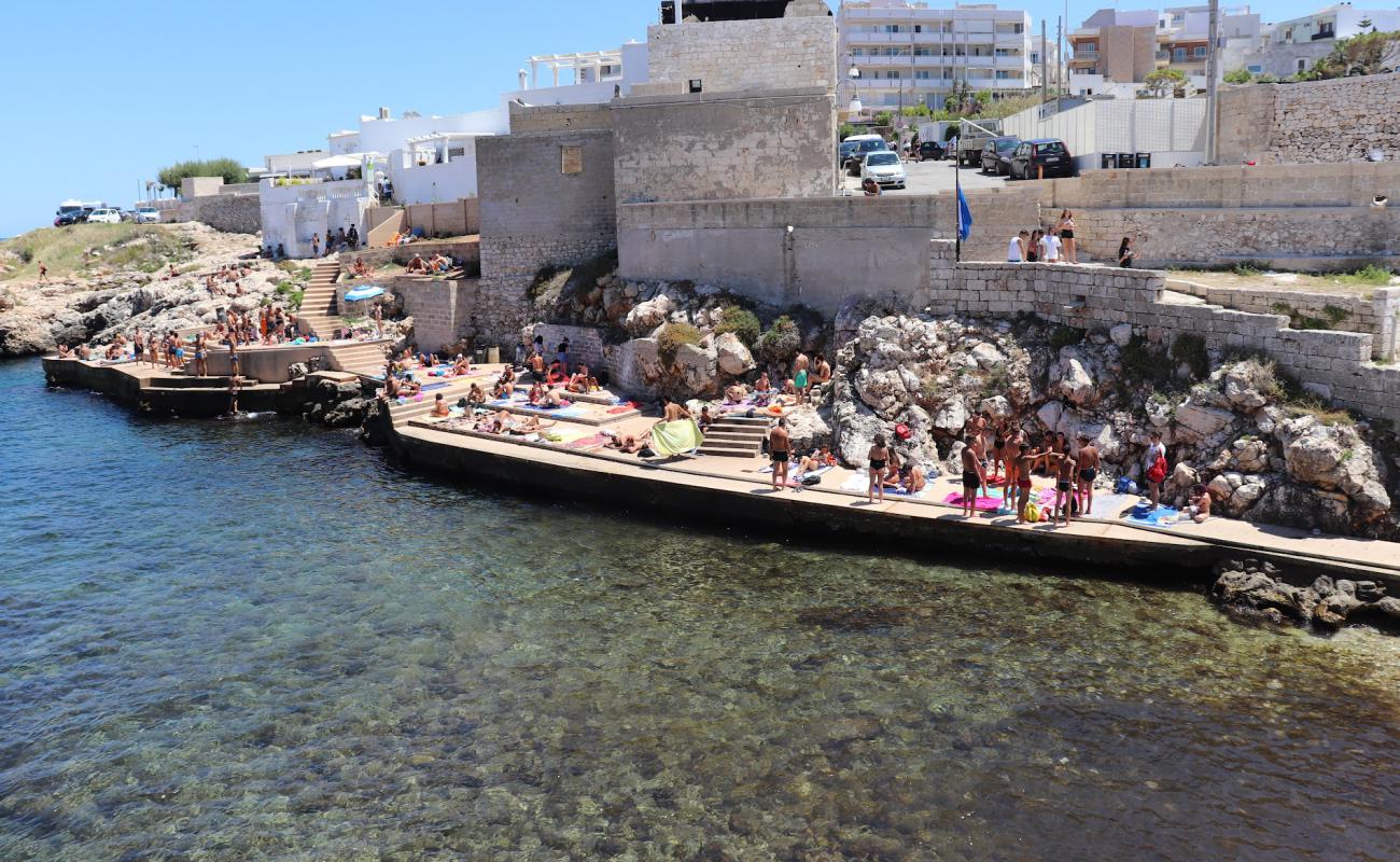 Photo of Cala Paguro with rocks cover surface