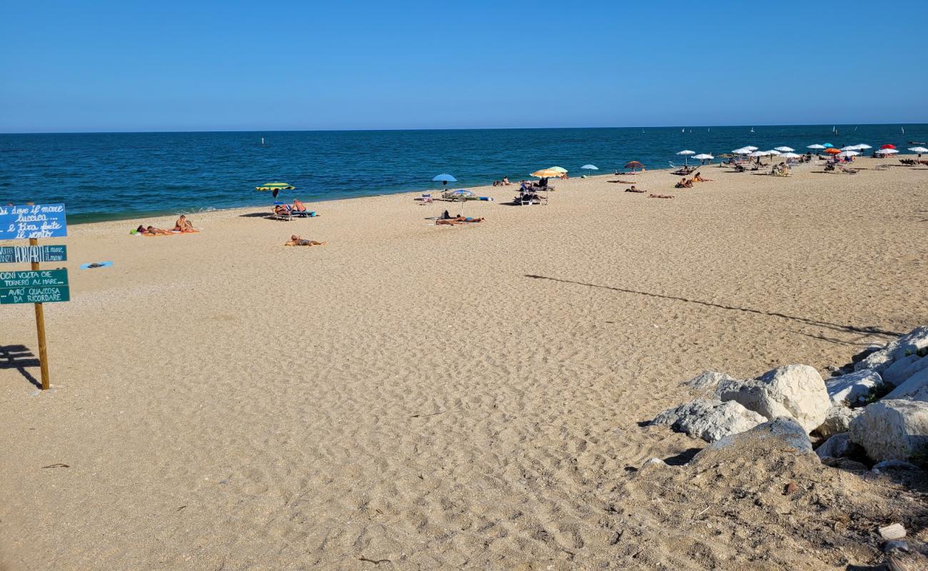 Photo of Spiaggia dei Scossicci with light fine pebble surface