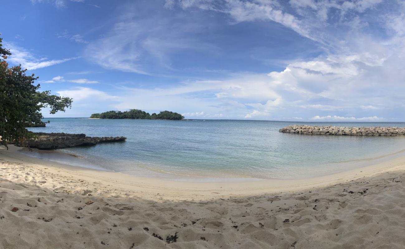 Photo of Orange Bay with bright sand surface