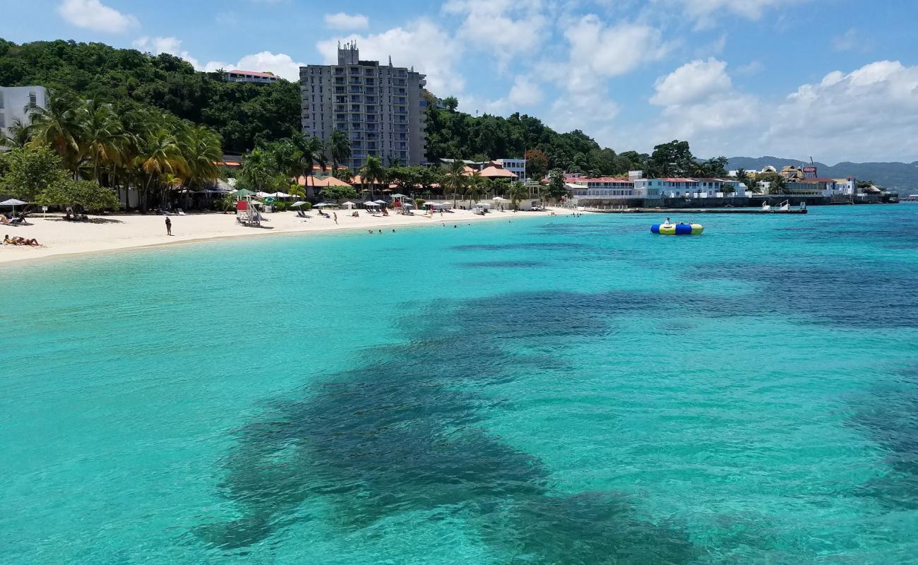 Photo of Doctor's Cave Beach with bright sand surface