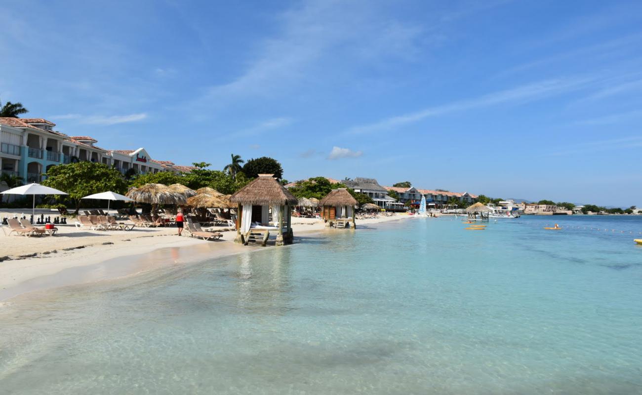 Photo of Sandals Montego Bay beach with bright fine sand surface