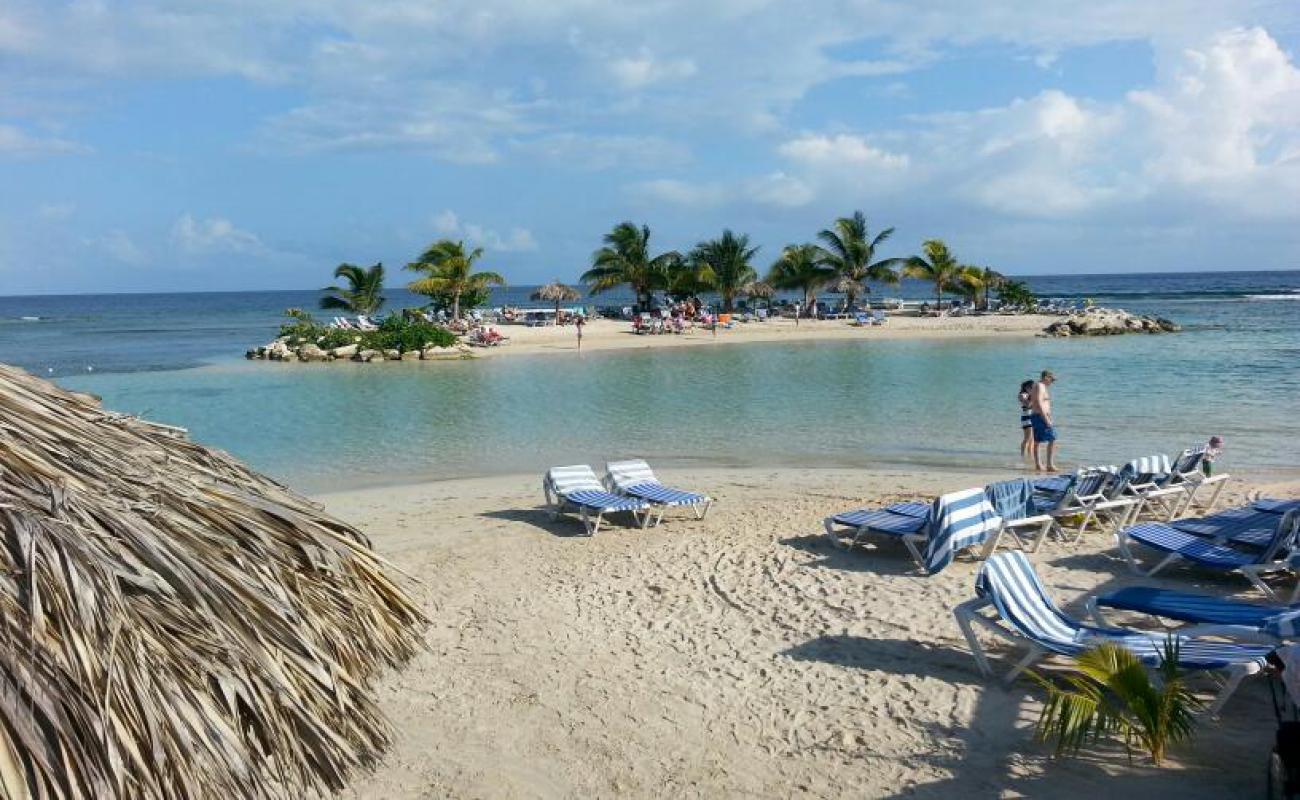 Photo of Holiday Inn Montego Bay beach with bright sand surface