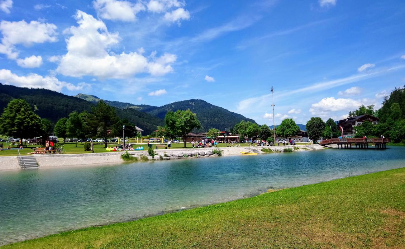 Photo of Achensee with light pebble surface