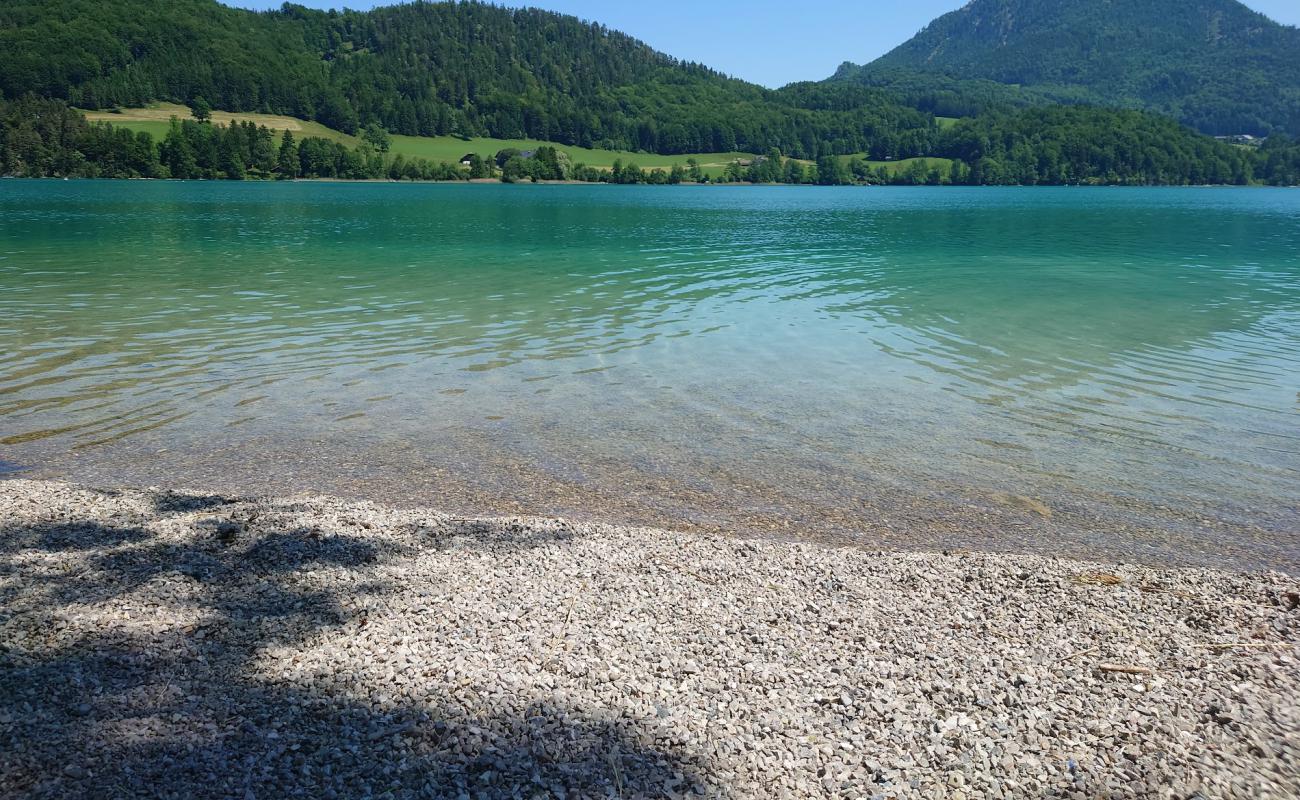 Photo of Badeplatz Stollinger with gray pebble surface