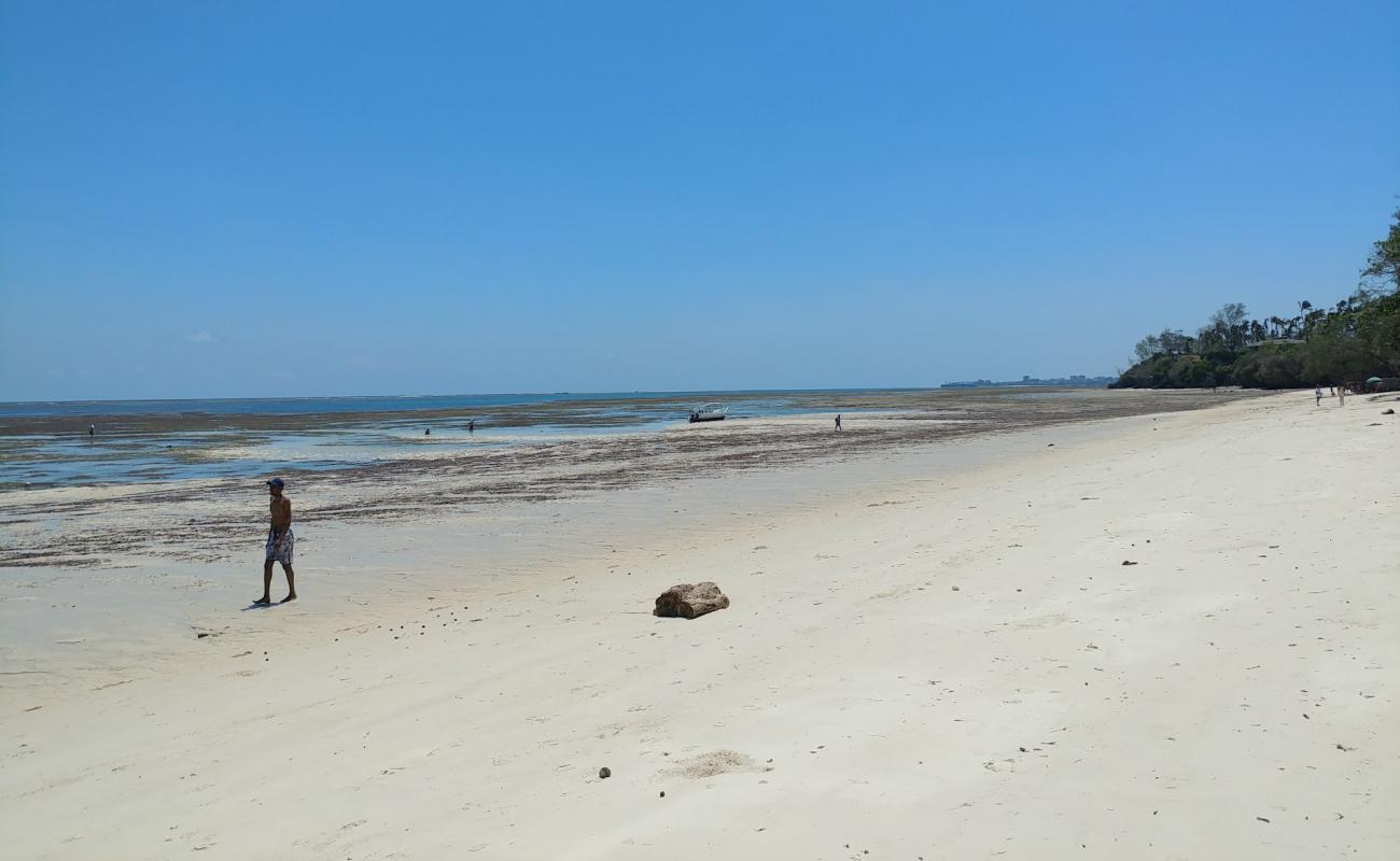 Photo of Jomo Kenyatta Beach with white fine sand surface