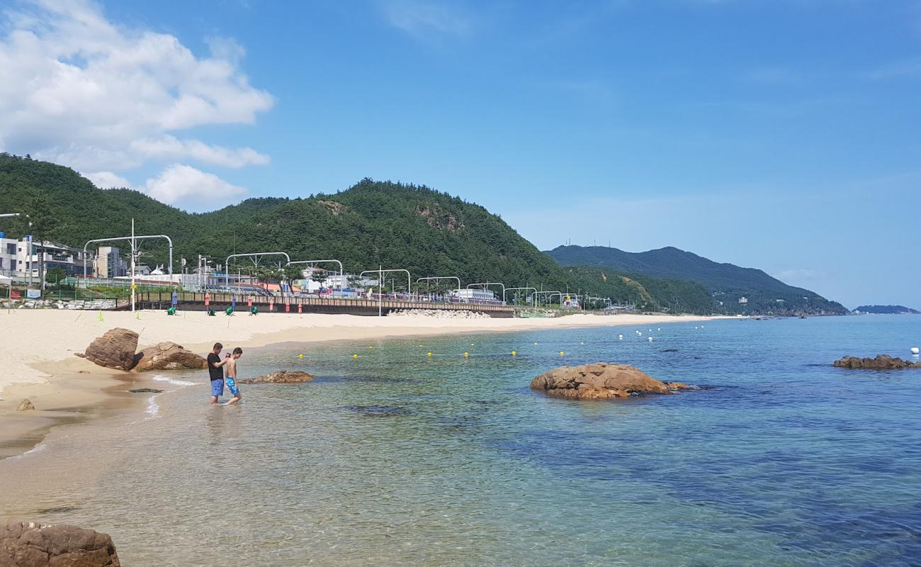 Photo of Jeongdongjin Beach with bright sand surface