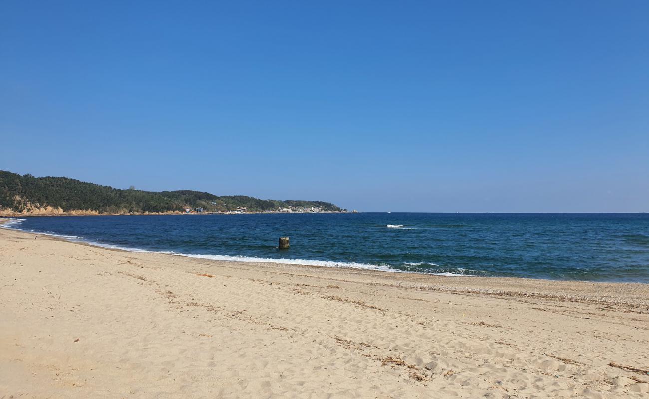 Photo of Uljinitis Jeon Beach with bright sand surface