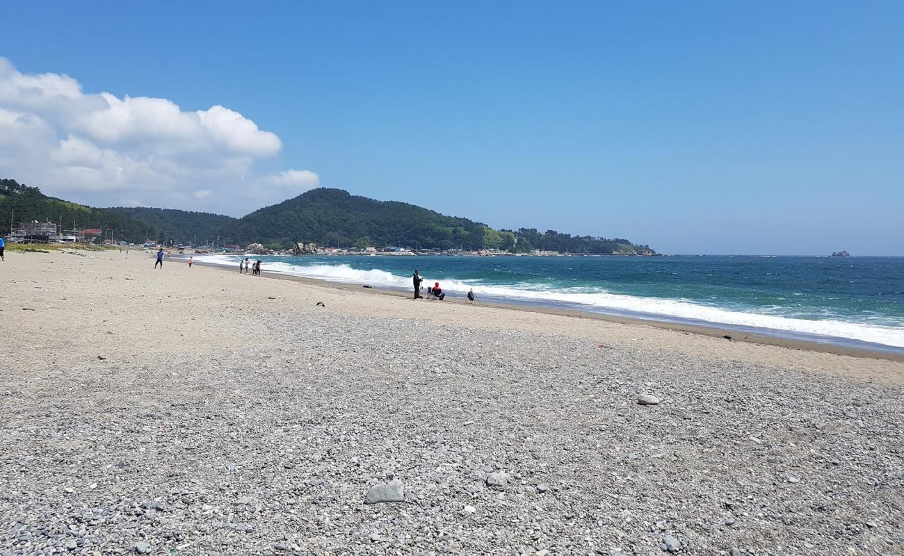 Photo of Shinchanggan Beach with gray sand &  pebble surface