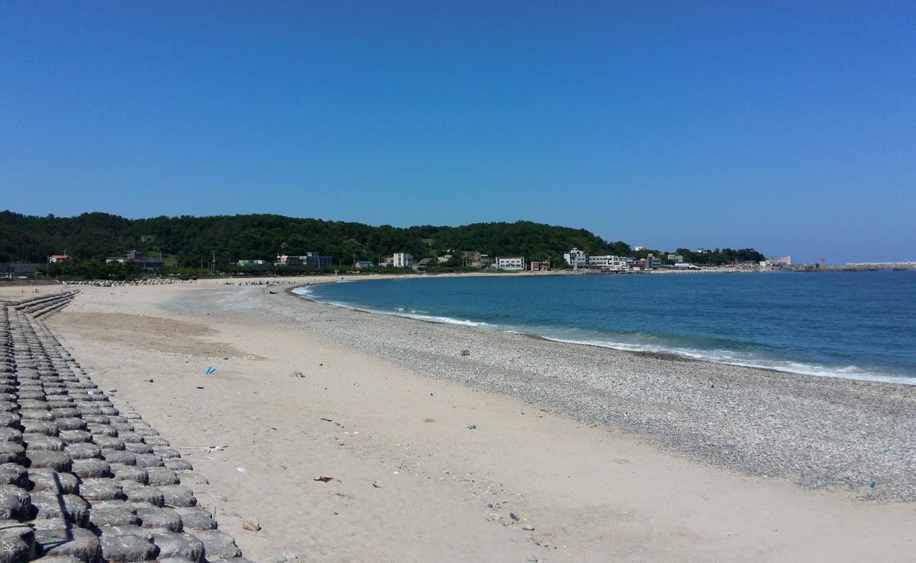 Photo of Gwanseong Beach with gray sand &  pebble surface