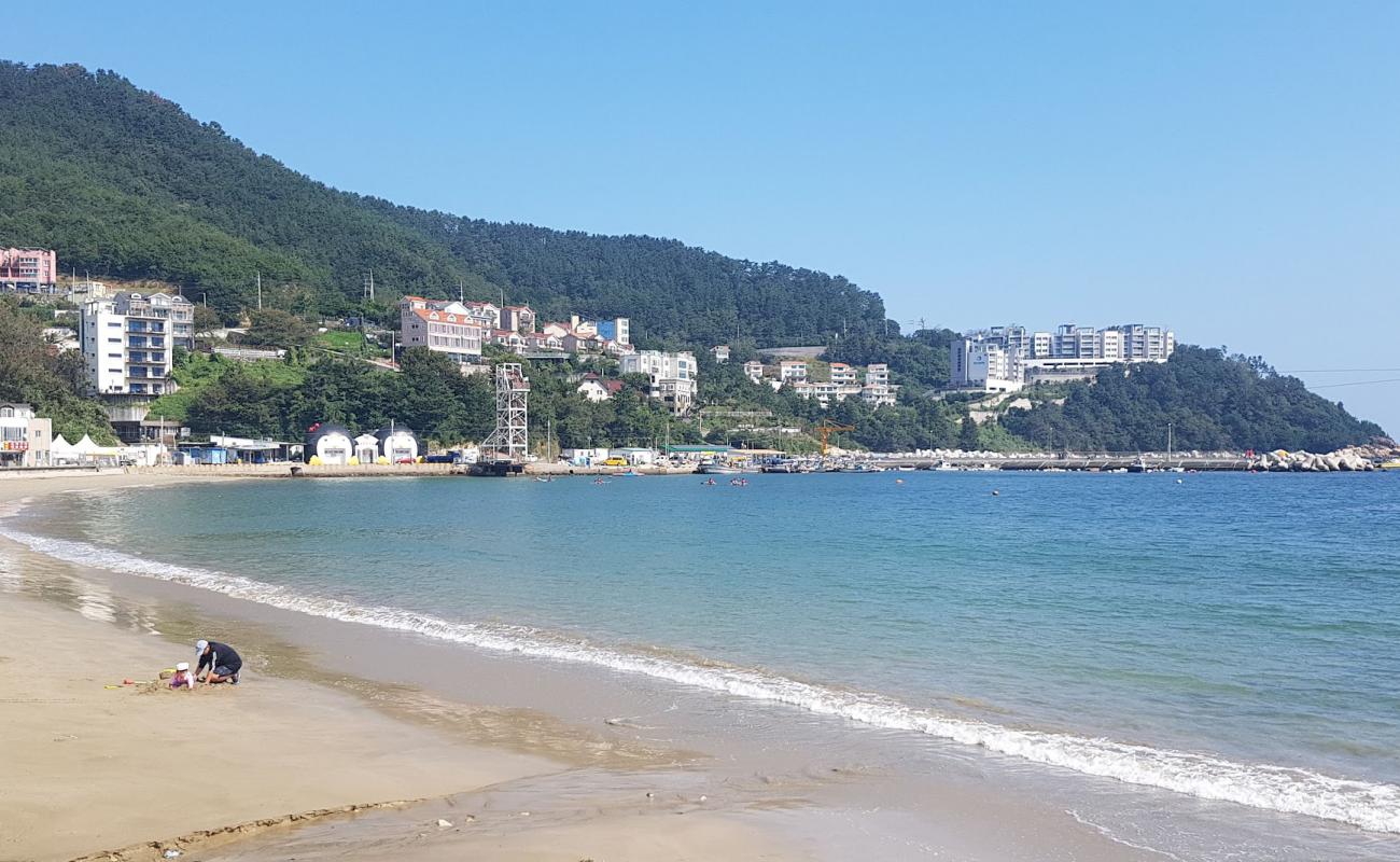 Photo of Deokpo Beach with bright sand surface