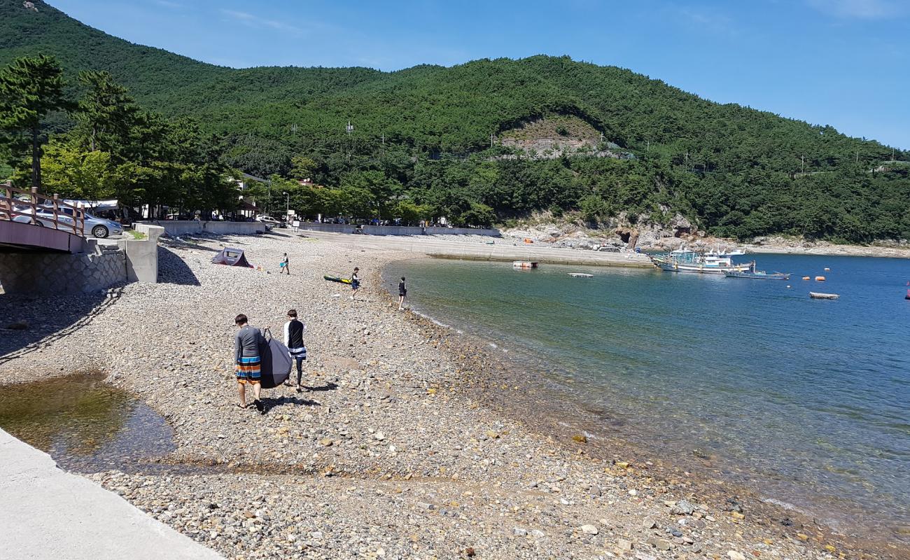 Photo of Hando Beach with gray pebble surface