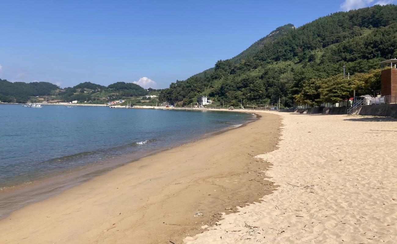 Photo of Cousin Beach with bright sand surface