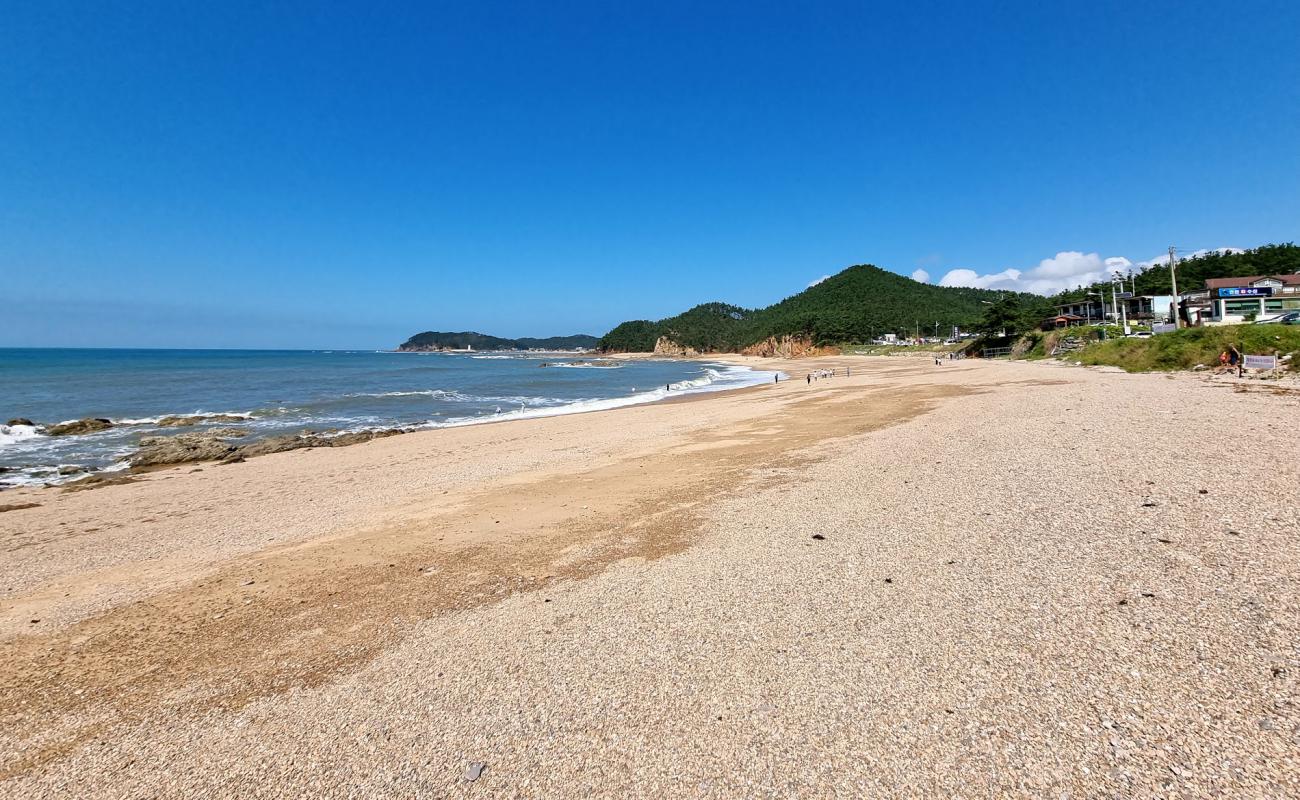 Photo of Padori Beach with light fine pebble surface