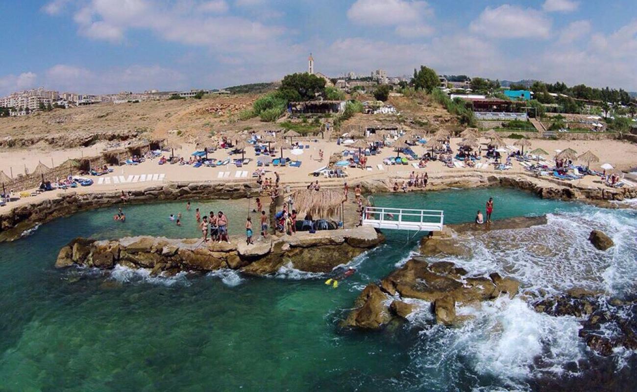 Photo of Jiyeh Beach with gray sand surface