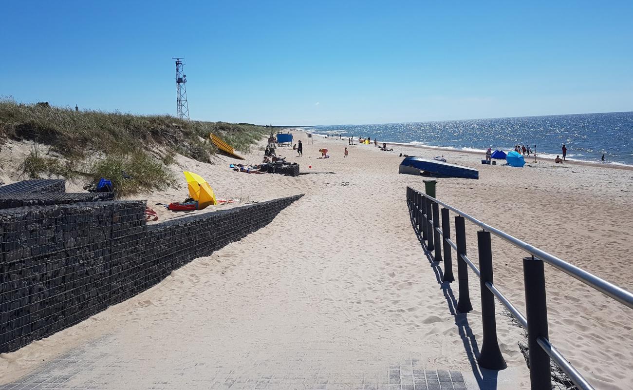 Photo of Kora Beach with bright fine sand surface