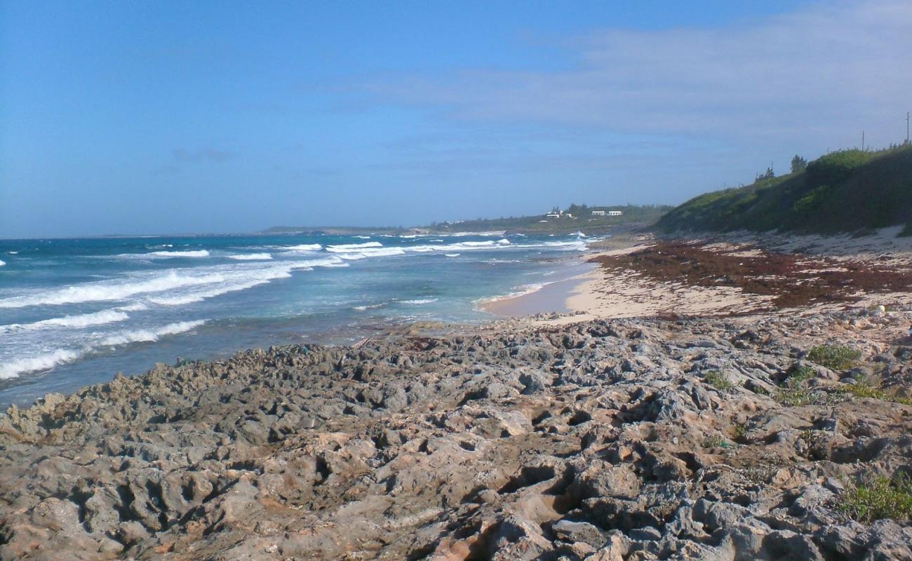 Photo of James Point beach with bright sand & rocks surface