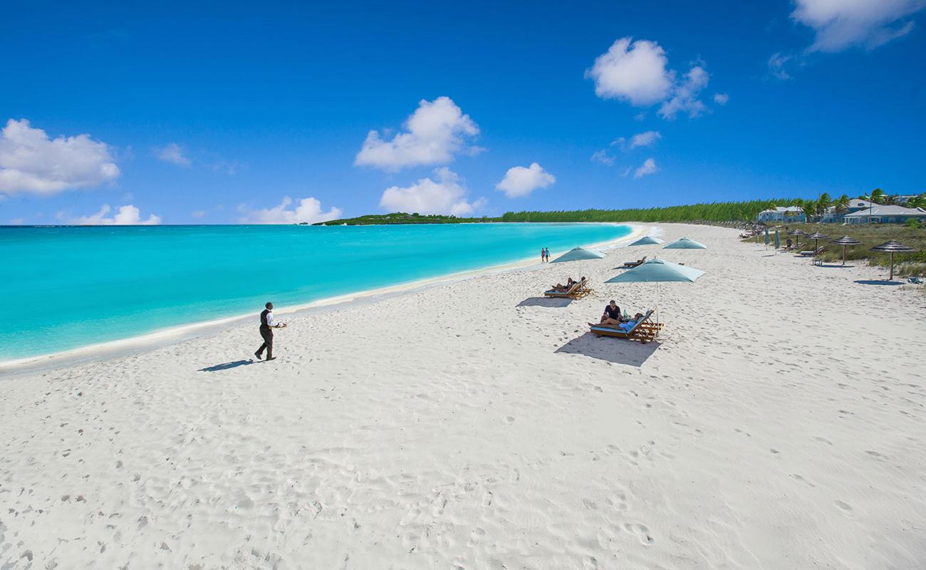 Photo of Sandals Emerald Bay beach with white fine sand surface