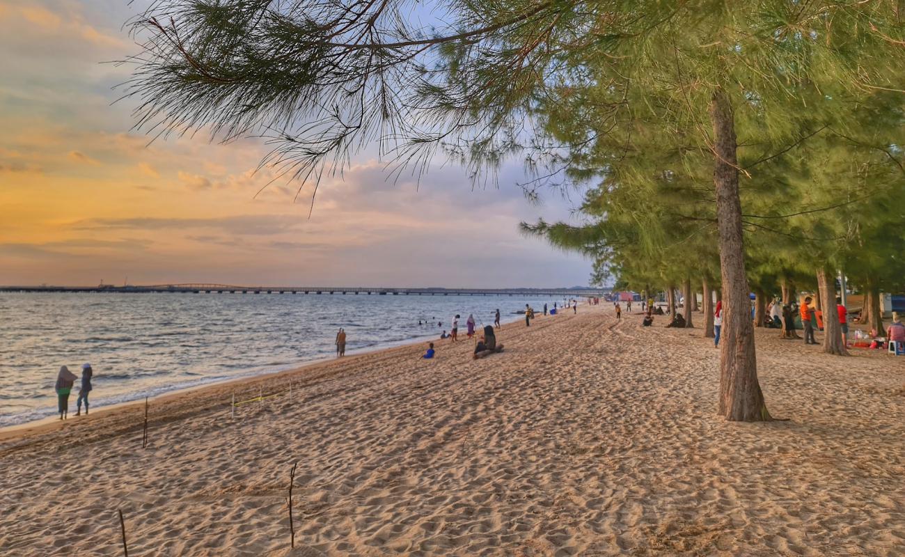 Photo of Puteri Beach with bright sand surface