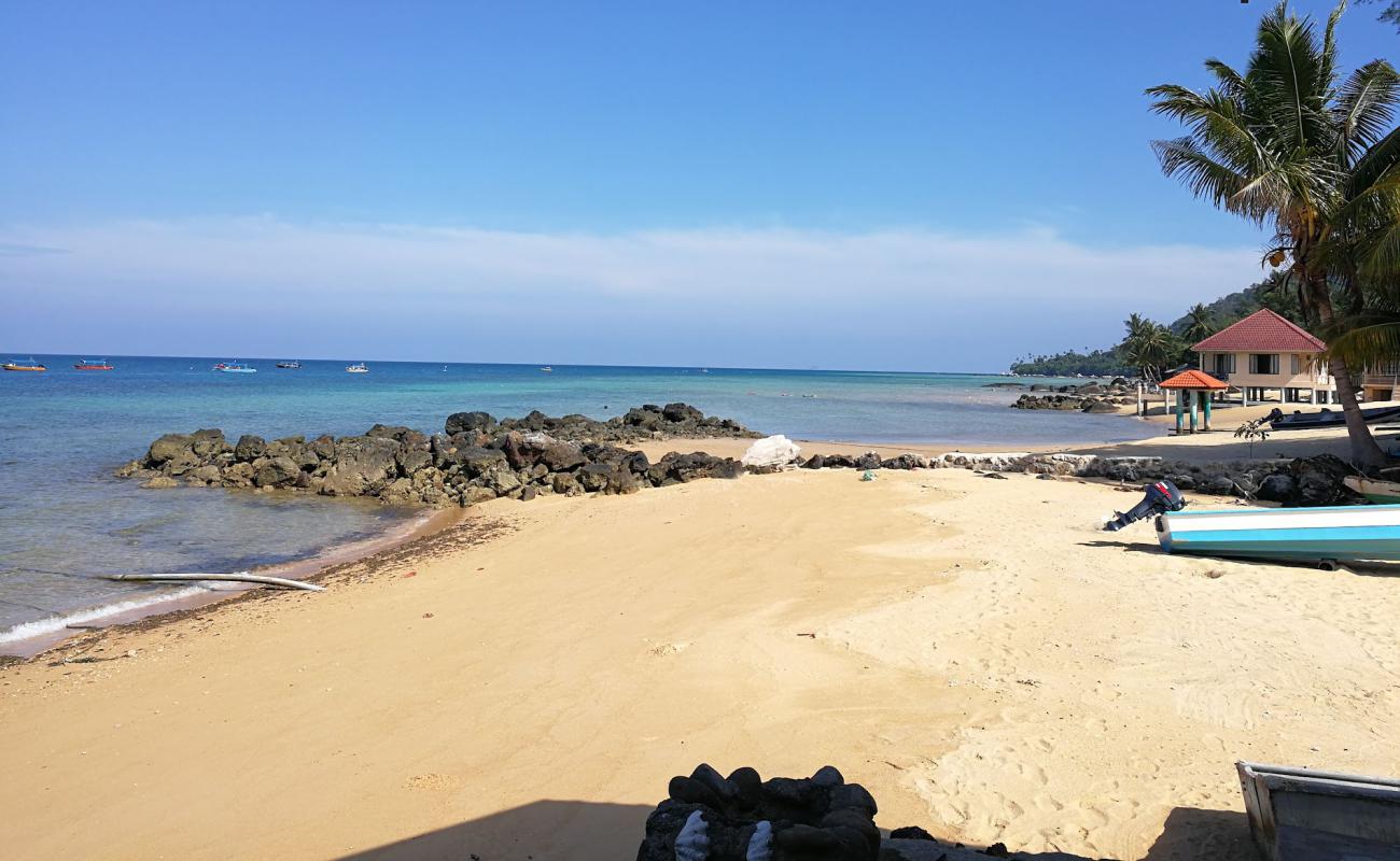 Photo of Coral Beach Tioman with gray sand surface