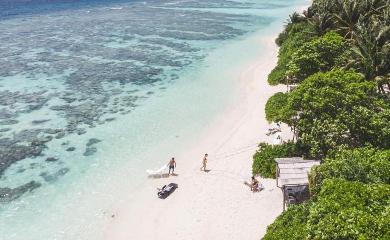 Photo of Plumeria Beach with white fine sand surface