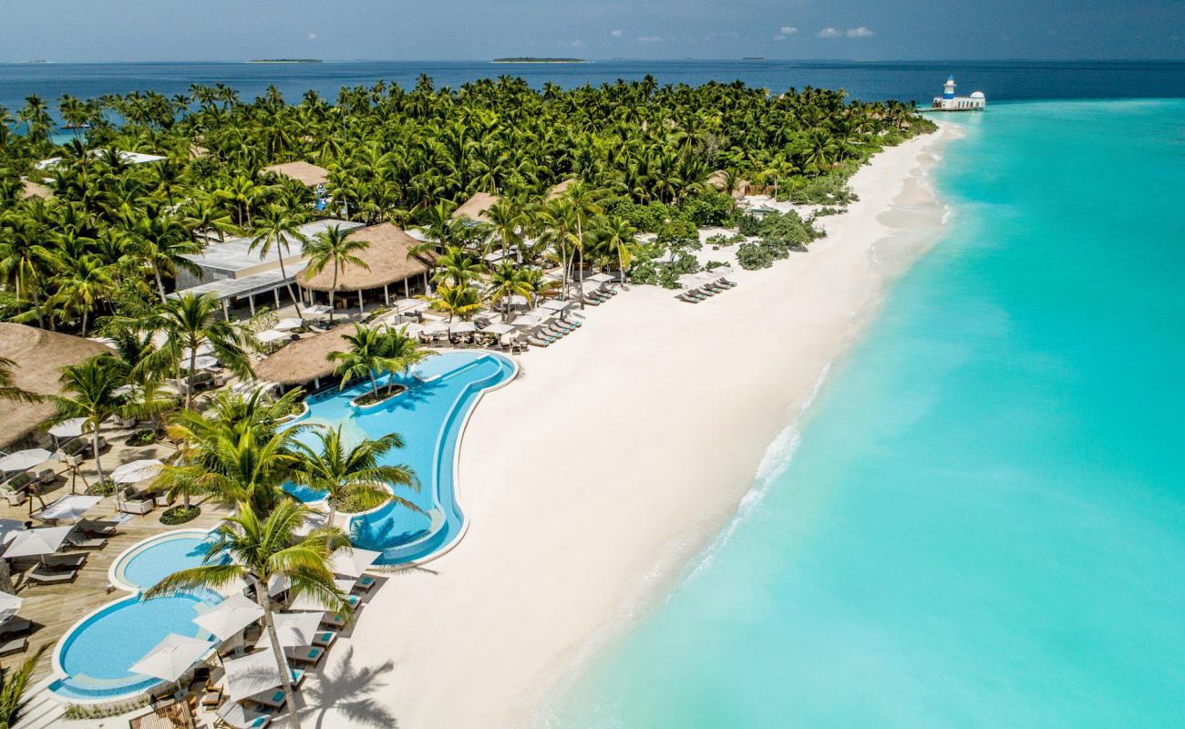 Photo of Collegues Beach with bright sand surface