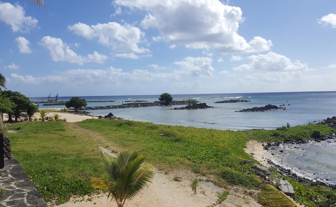 Photo of Pointe Aux Biches with bright sand & rocks surface