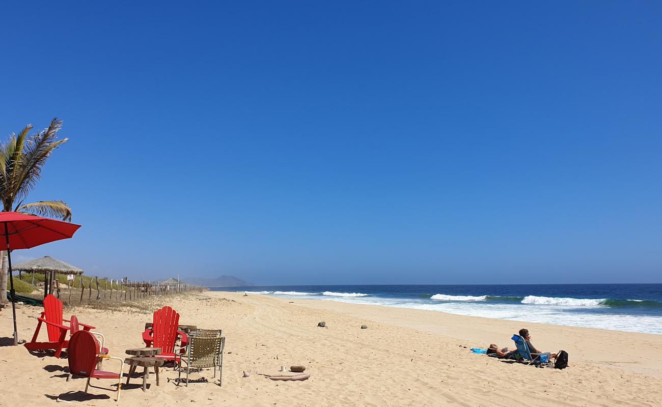 Photo of Playa la Pastora with brown fine sand surface