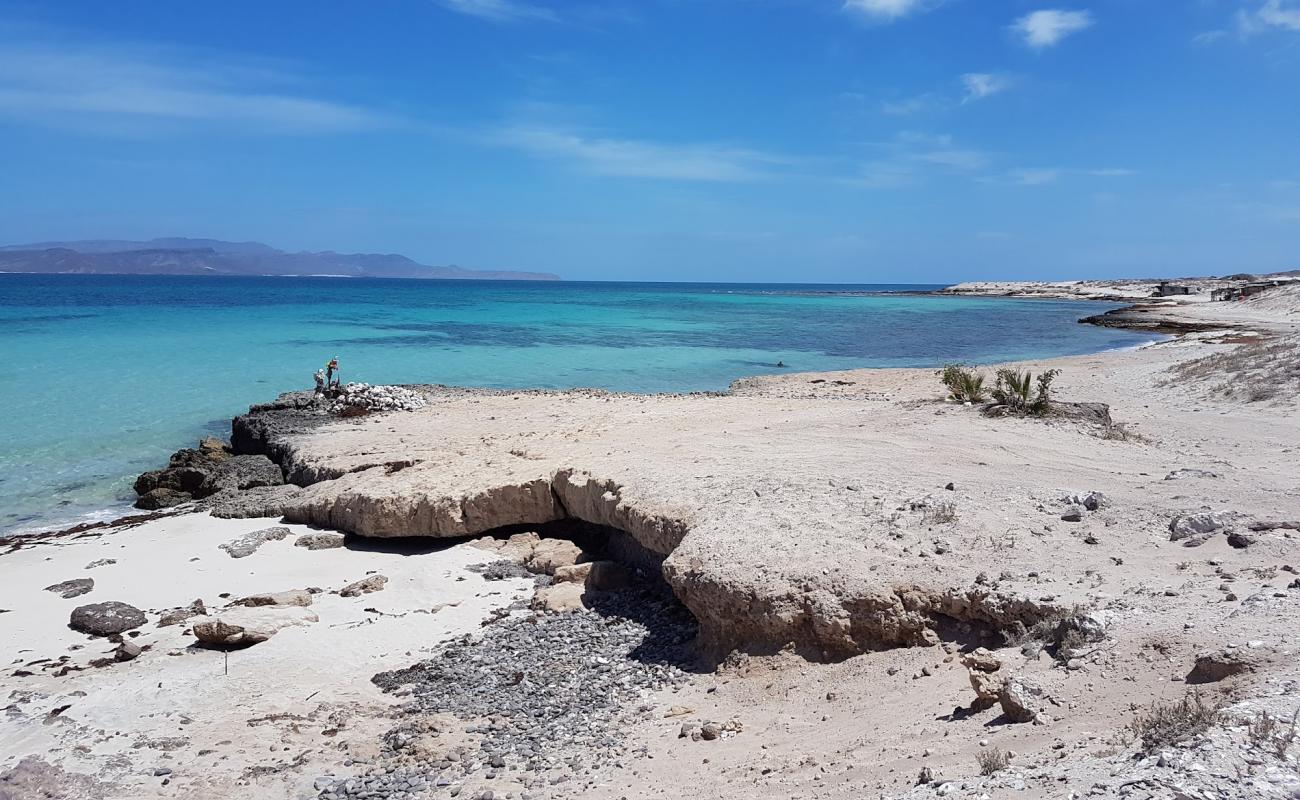 Photo of Las Pilitas with bright sand & rocks surface