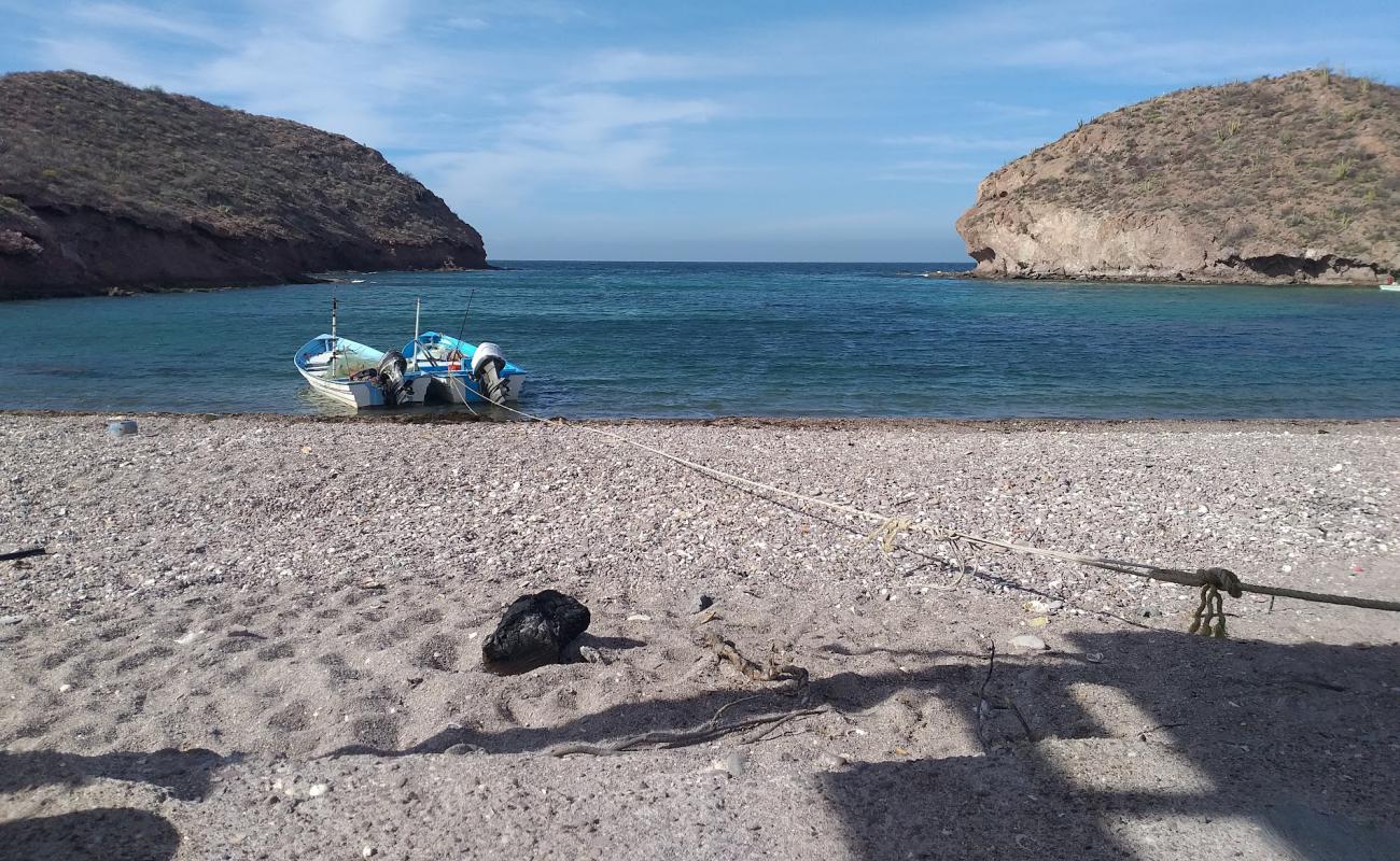 Photo of Ensenada Chica with gray pebble surface