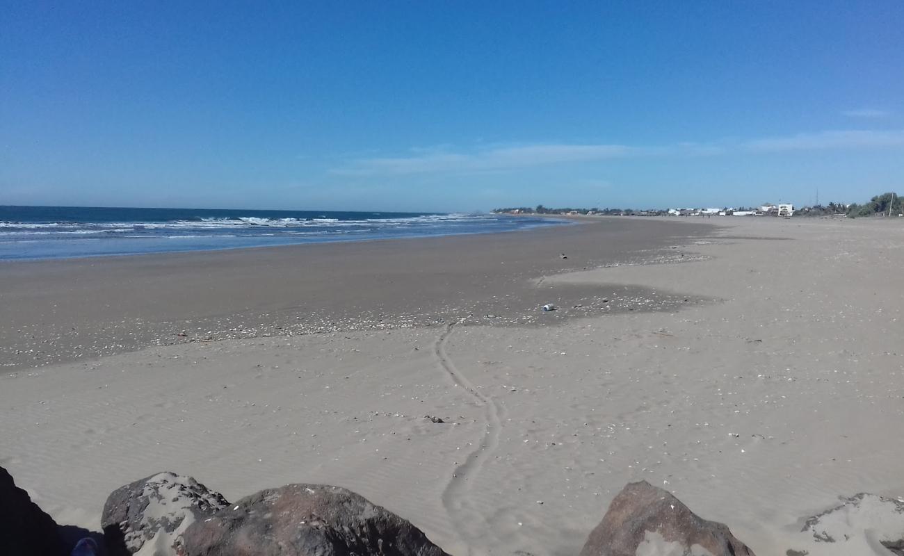 Photo of Las Glorias beach with bright sand surface