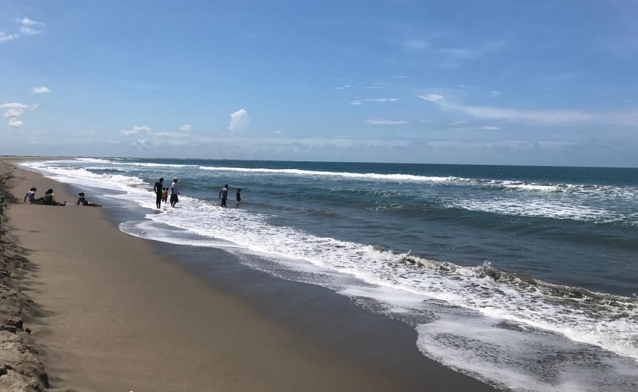 Photo of El Tambor beach with bright sand surface