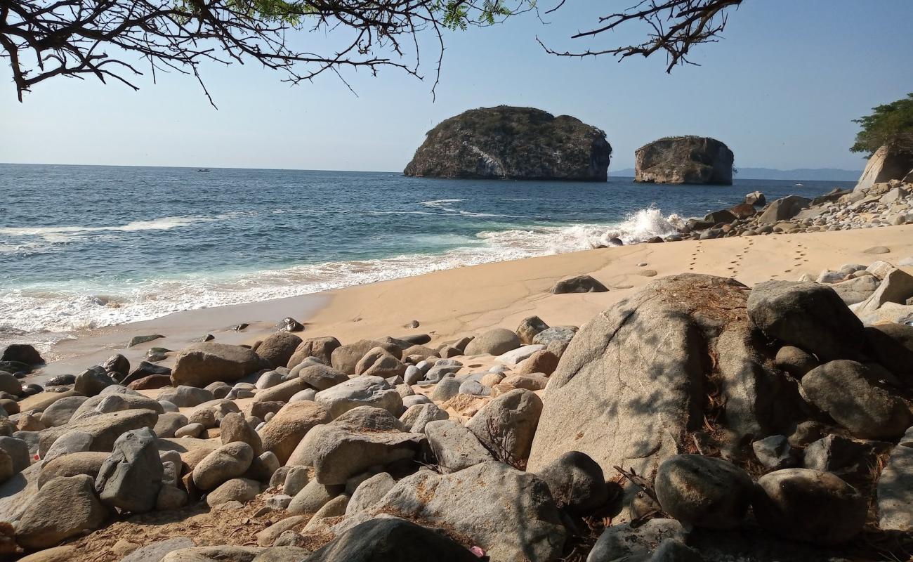 Photo of Arcos beach with bright sand & rocks surface