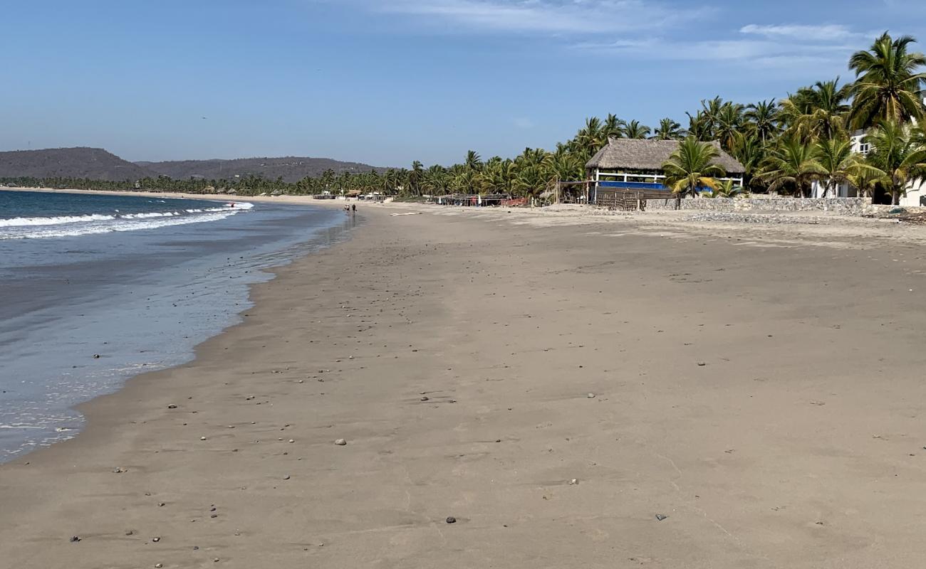 Photo of Playa La Manzanilla with brown fine sand surface