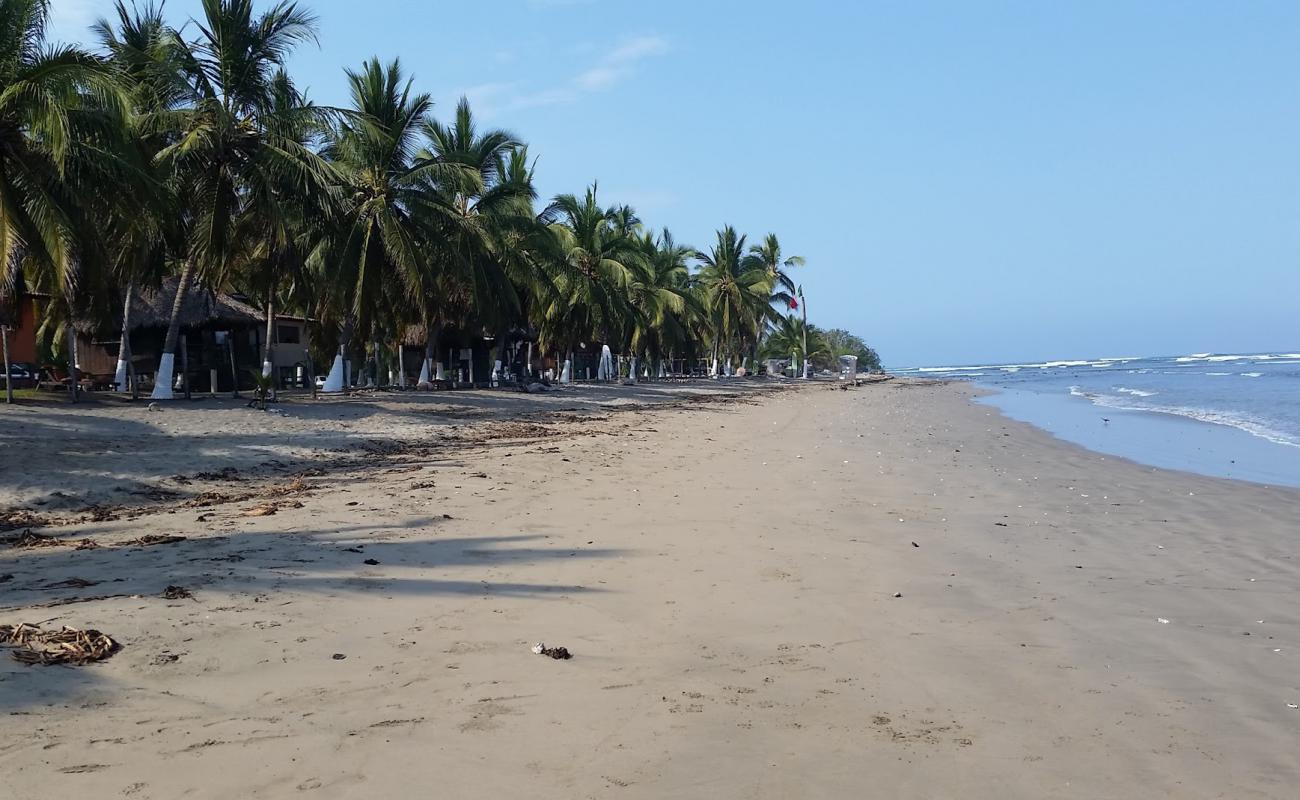 Photo of Playa La Saladita with brown sand surface