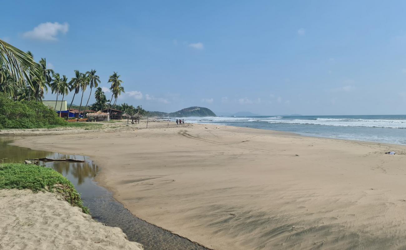 Photo of Playa Troncones with bright fine sand surface