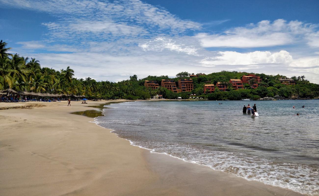 Photo of Playa Quieta with brown fine sand surface