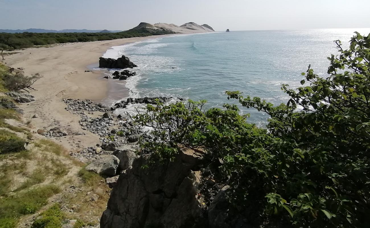 Photo of Escondida beach with gray sand surface