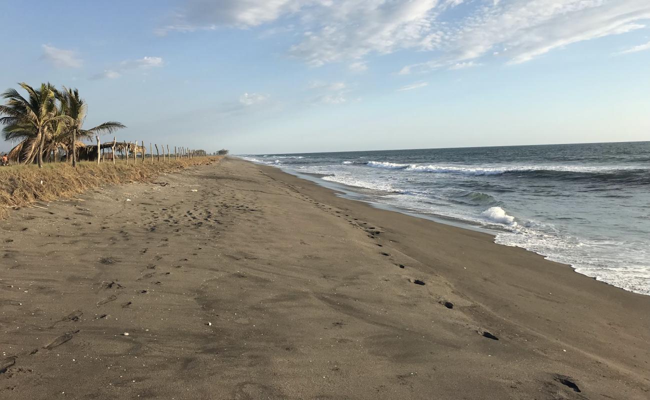 Photo of San Simon beach with gray sand surface