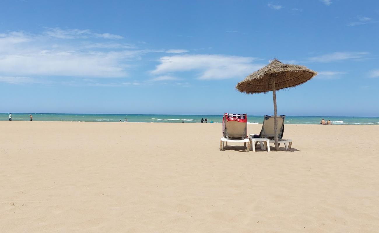 Photo of Melia beach with bright sand surface