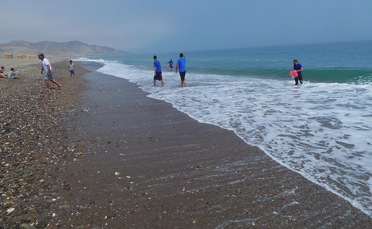 Photo of Plage Sidi Driss with gray sand &  pebble surface