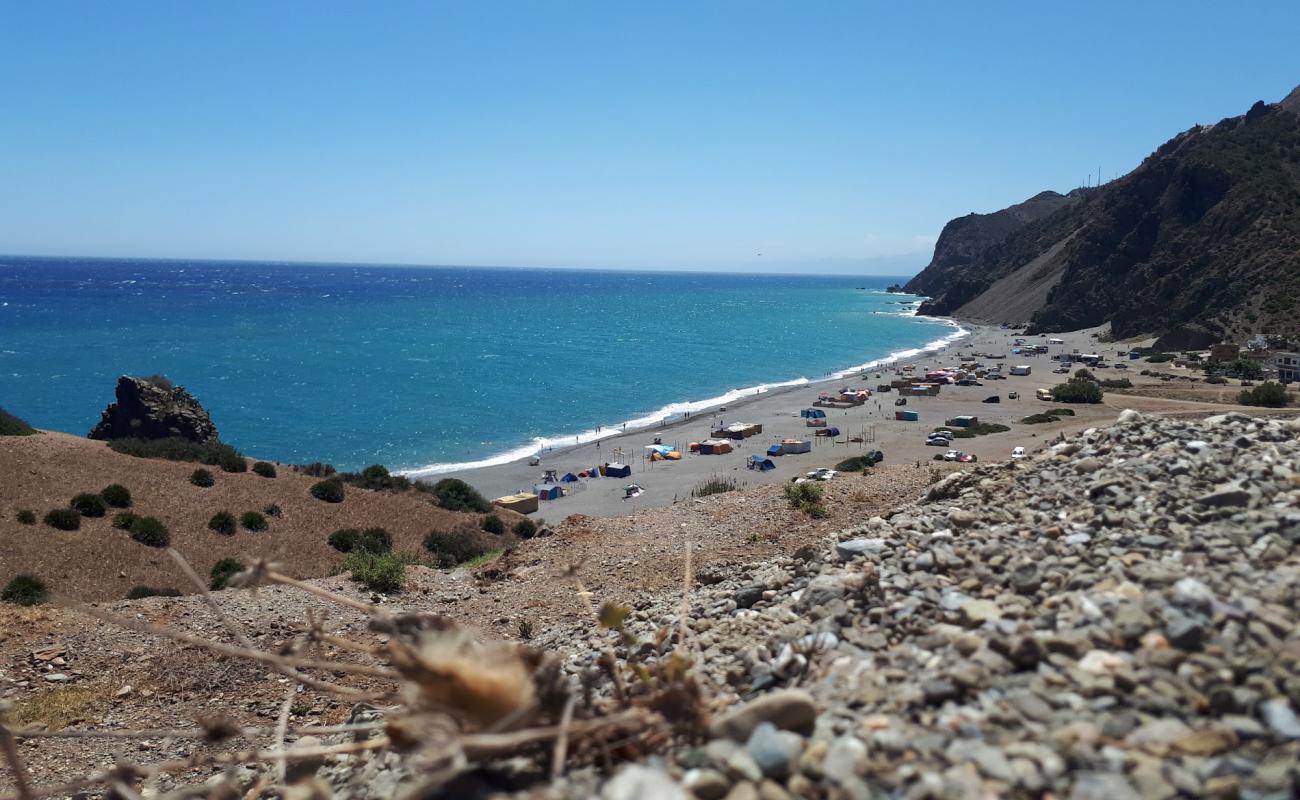 Photo of Plage Beni Baroun with gray fine pebble surface