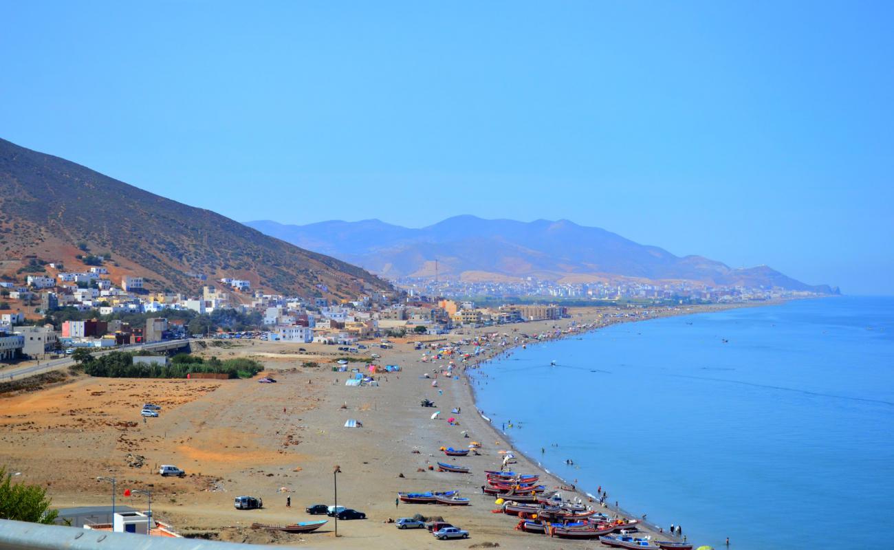 Photo of Plage Oued Laou with gray sand surface