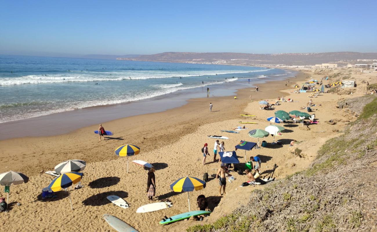 Photo of Taghazout Beach with bright fine sand surface