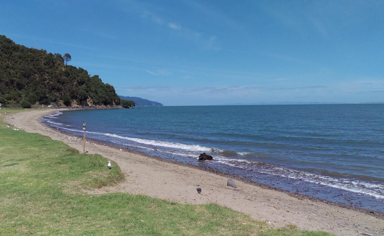 Photo of Tapu Beach with black sand & pebble surface